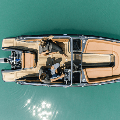 Above shot of the magonis wave with two people in boat in the captain chairs