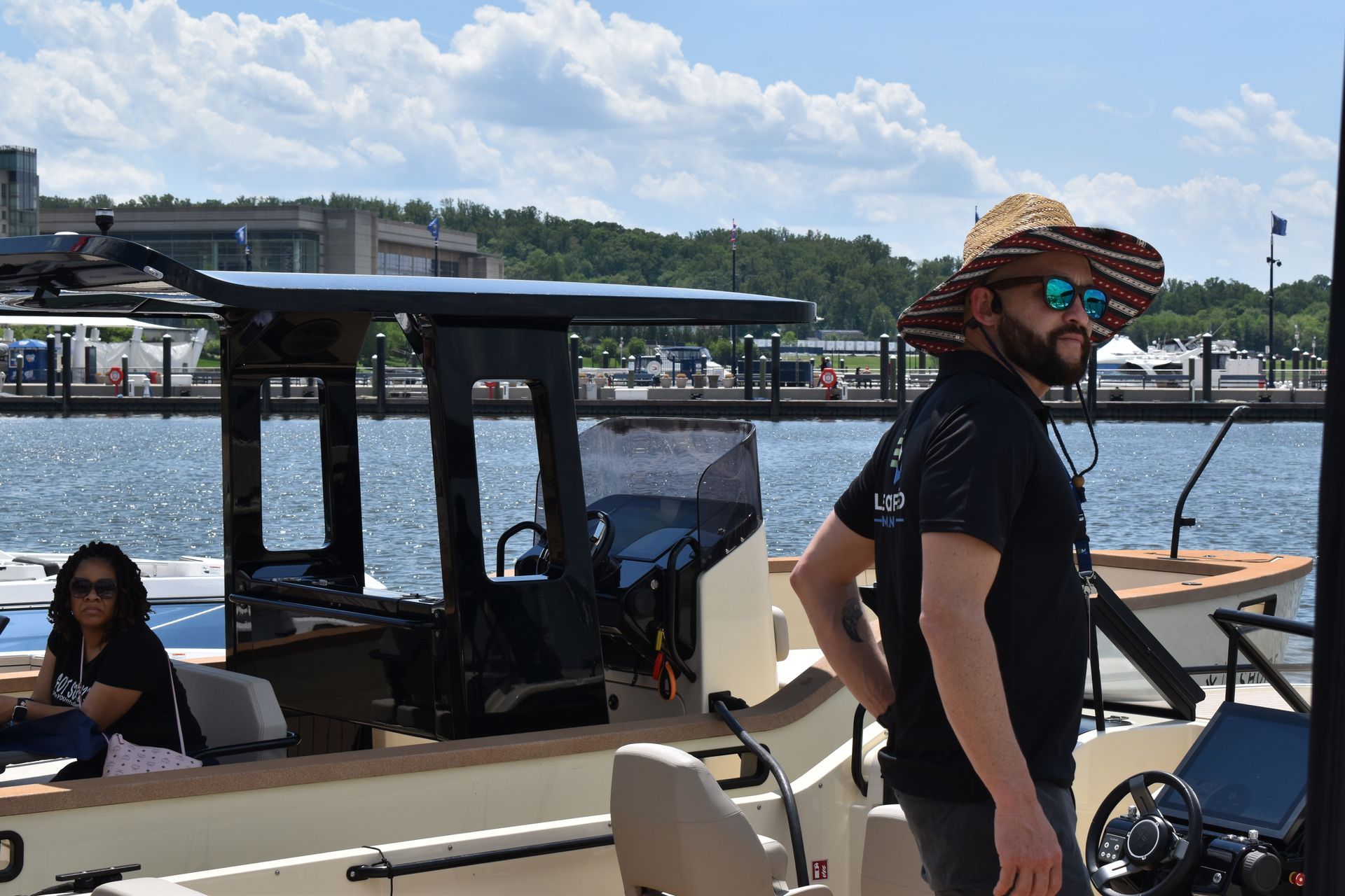Electric boats gathered at a marina dock